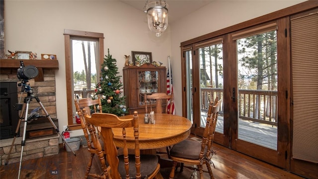 dining room featuring a chandelier, french doors, and wood finished floors