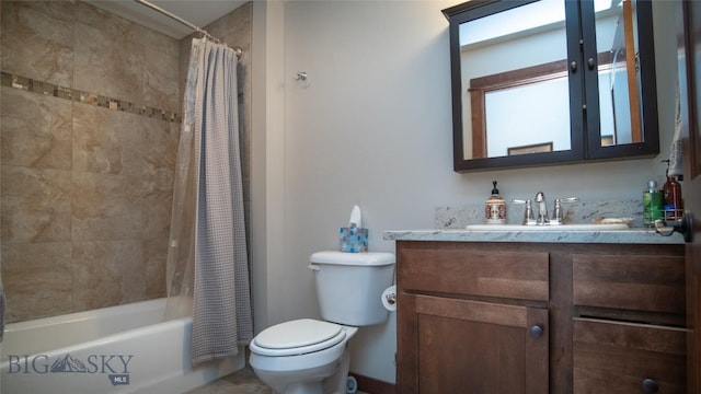 bathroom featuring shower / bath combo, vanity, and toilet