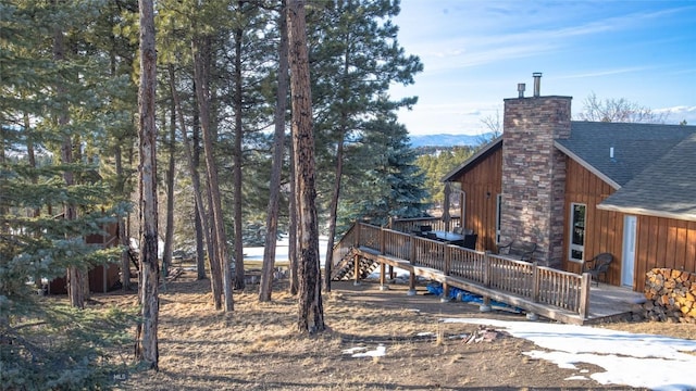 view of yard featuring a wooden deck