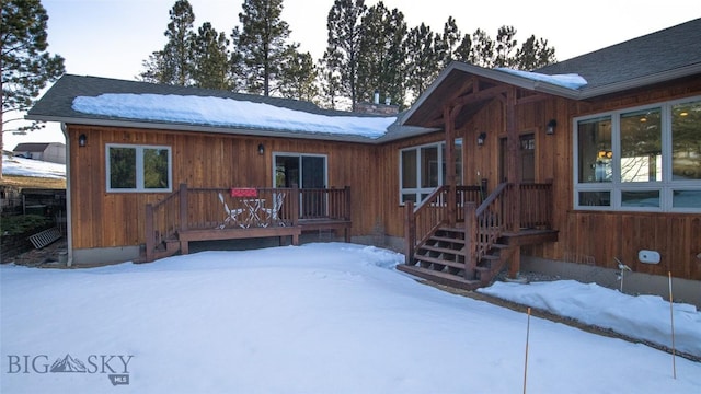 view of front of house featuring a shingled roof