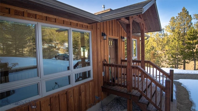 wooden deck featuring stairway