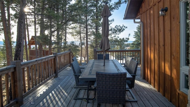 deck featuring outdoor dining space