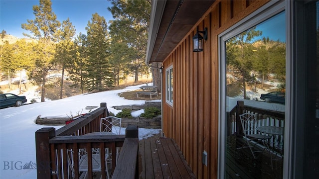 view of snow covered deck