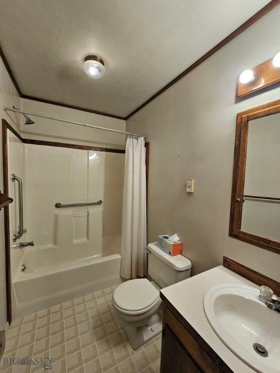 full bathroom with vanity, shower / bath combo with shower curtain, toilet, and crown molding