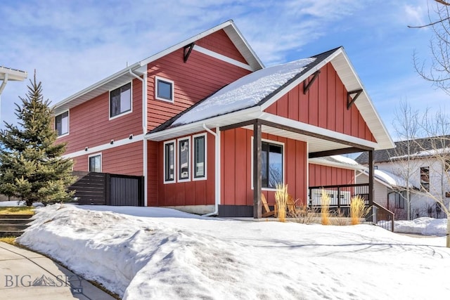 view of front of house with covered porch and board and batten siding