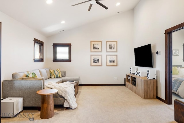 living room featuring lofted ceiling, recessed lighting, light colored carpet, a ceiling fan, and baseboards