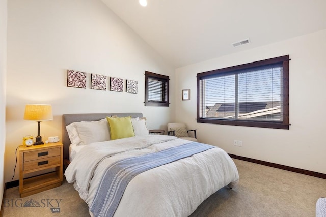 bedroom with carpet floors, high vaulted ceiling, visible vents, and baseboards