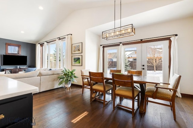 dining room featuring lofted ceiling, french doors, dark wood finished floors, and recessed lighting