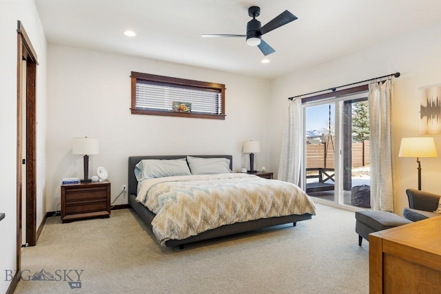 bedroom featuring access to outside, recessed lighting, and light colored carpet