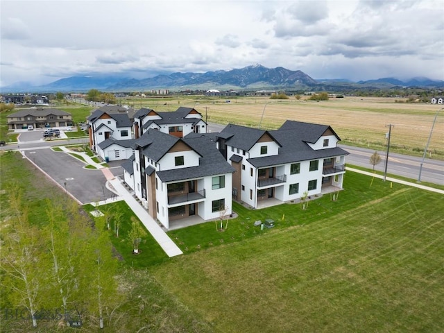 birds eye view of property featuring a residential view and a mountain view