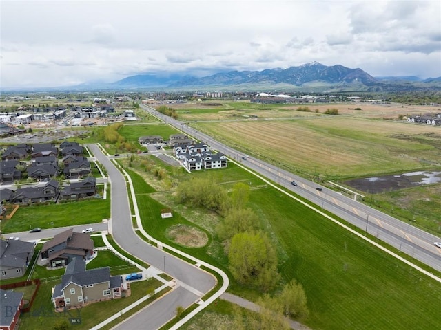 drone / aerial view with a residential view and a mountain view