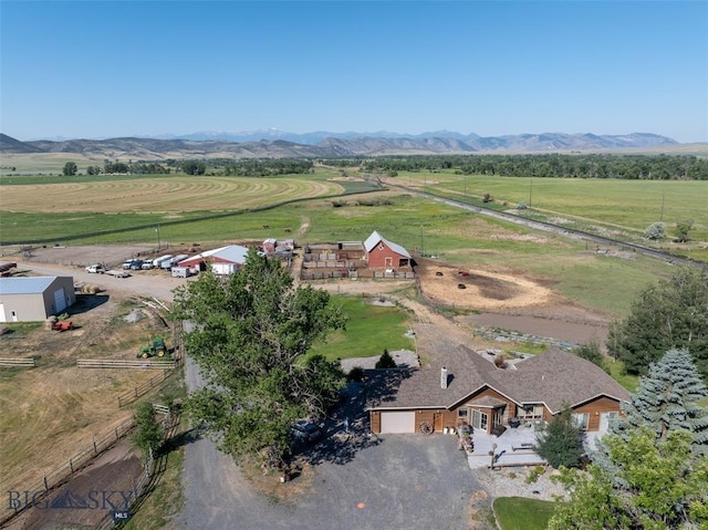 bird's eye view featuring a mountain view and a rural view