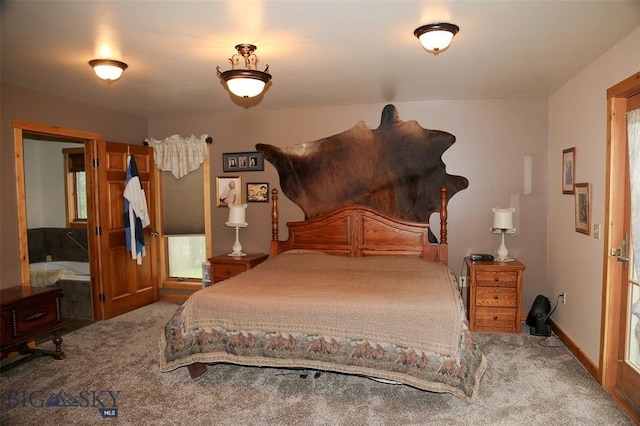 carpeted bedroom with baseboards