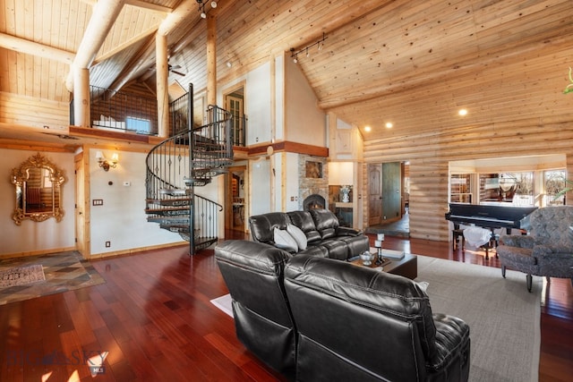 living area featuring stairway, wood ceiling, and wood-type flooring