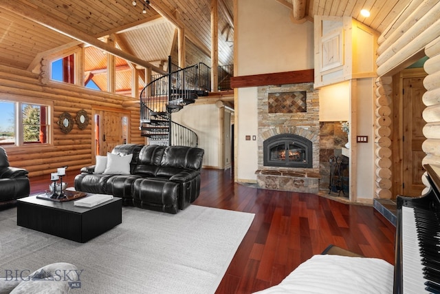 living area with wood ceiling, a fireplace, high vaulted ceiling, and beamed ceiling