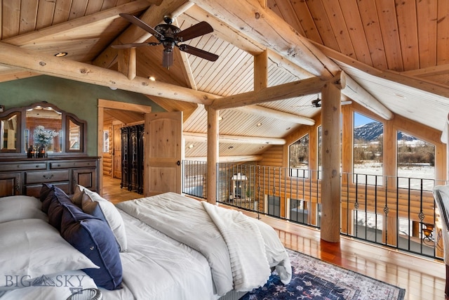 bedroom with lofted ceiling with beams, wooden ceiling, wood finished floors, access to outside, and a spacious closet