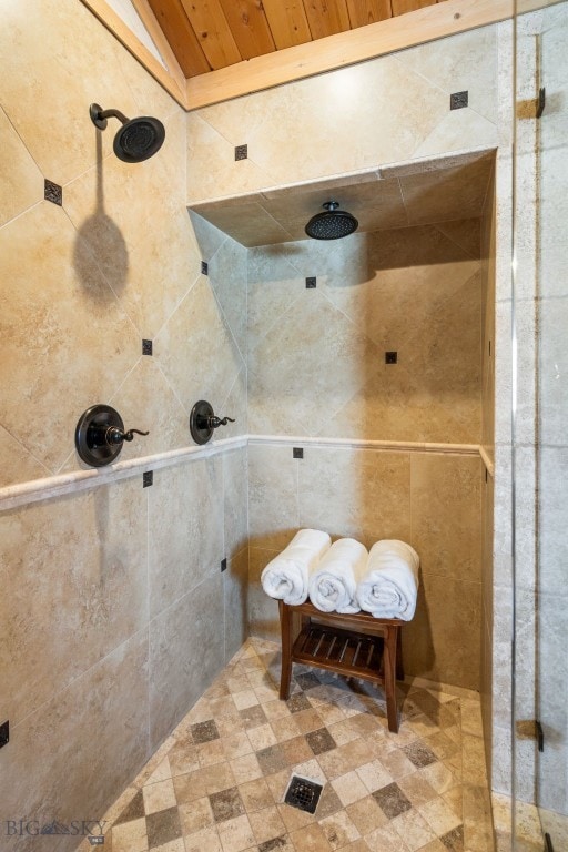 full bathroom with a tile shower