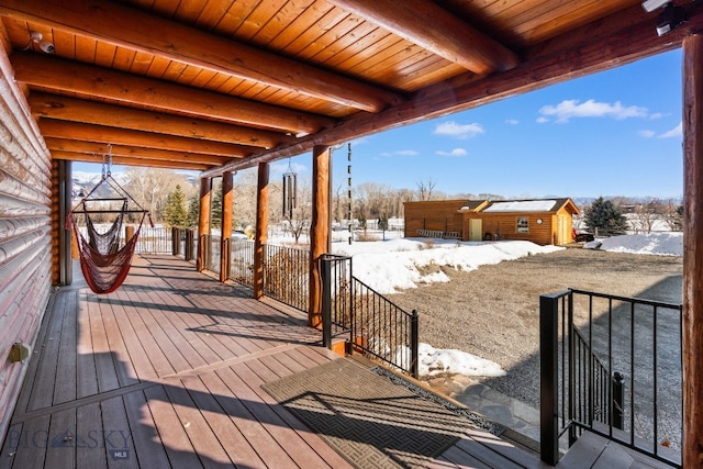 view of snow covered deck