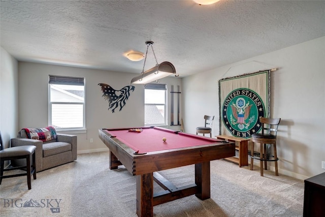 playroom with baseboards, a textured ceiling, pool table, and carpet flooring