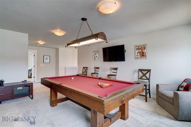 playroom with baseboards, light carpet, a textured ceiling, and billiards