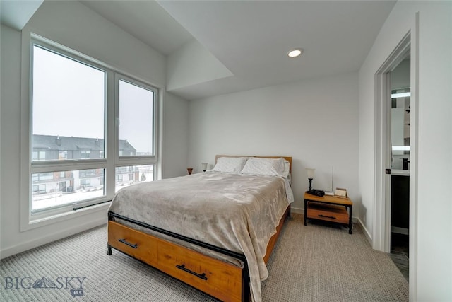 bedroom featuring recessed lighting, baseboards, and light carpet