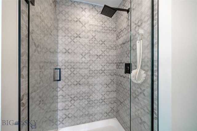 bathroom with a stall shower