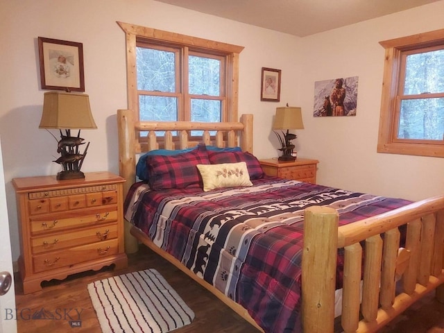 bedroom featuring wood finished floors