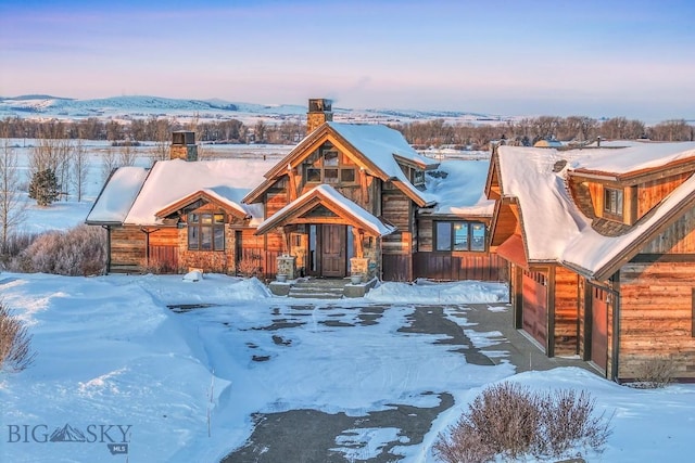 rustic home featuring a chimney