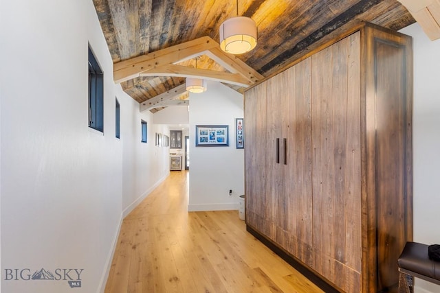 1468 Black Bull Trl, Bozeman, MT 59718 - hall featuring wood ceiling, light wood-style flooring, and baseboards