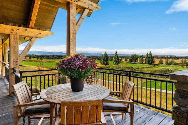 wooden terrace with a mountain view