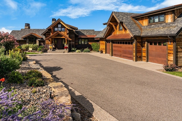 view of front of house featuring a shingled roof