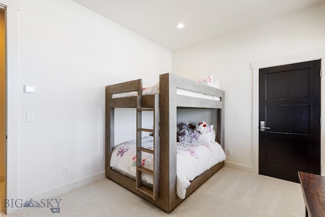 bedroom with recessed lighting, baseboards, and carpet flooring