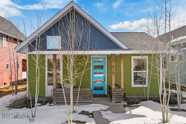 view of front of house featuring roof with shingles