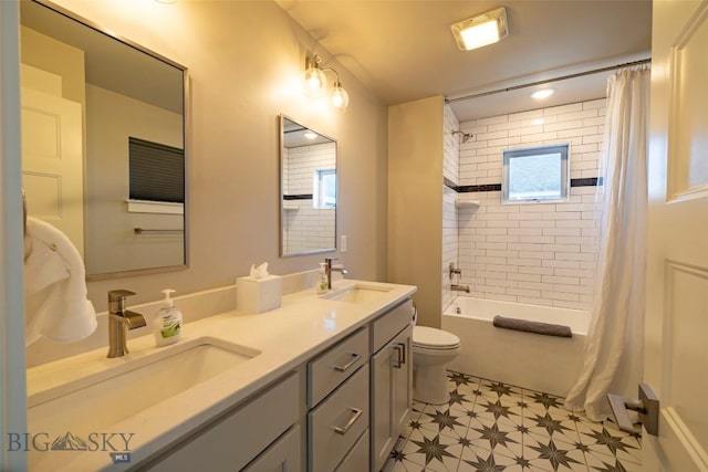 309 Meriwether, Bozeman, MT 59718 - full bathroom featuring double vanity, toilet, tile patterned floors, and a sink