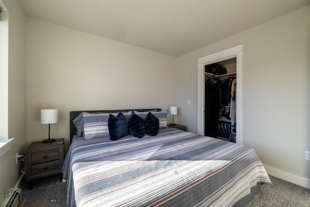 309 Meriwether, Bozeman, MT 59718 - bedroom with carpet floors, baseboards, a spacious closet, a baseboard heating unit, and a closet