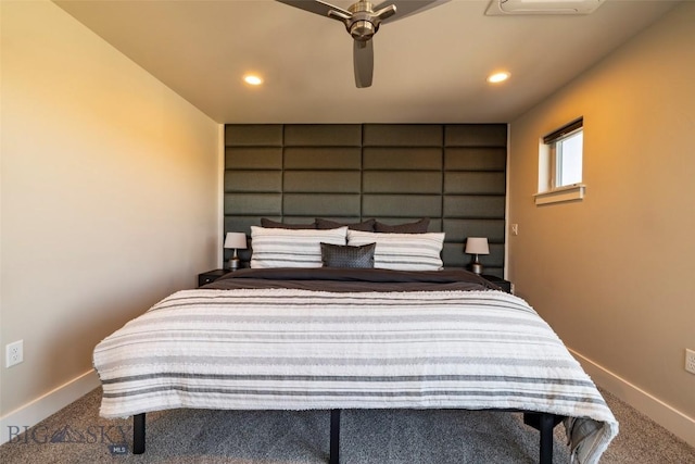 bedroom featuring recessed lighting, baseboards, and carpet