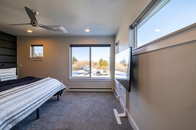 unfurnished bedroom with a ceiling fan, recessed lighting, carpet, and baseboard heating