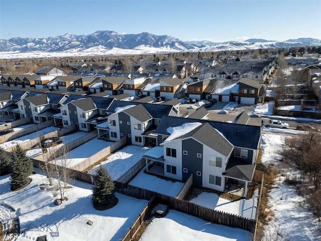 birds eye view of property with a mountain view and a residential view