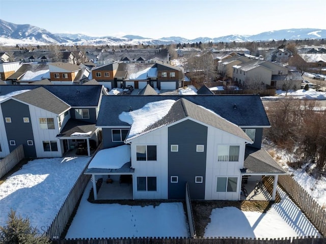 birds eye view of property featuring a residential view and a mountain view