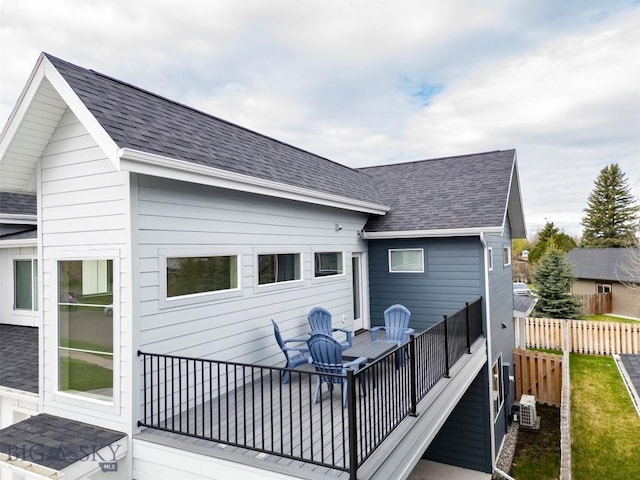 309 Meriwether, Bozeman, MT 59718 - rear view of property featuring fence and roof with shingles