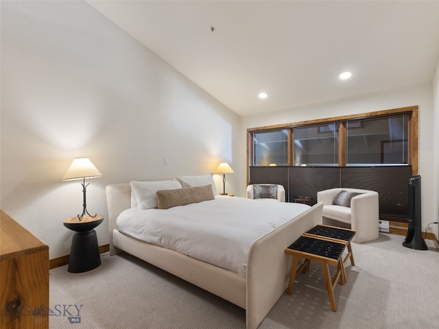 bedroom featuring vaulted ceiling, recessed lighting, baseboards, and carpet floors