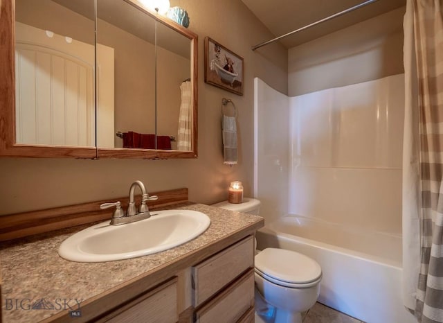 full bath featuring shower / bath combination with curtain, toilet, and vanity