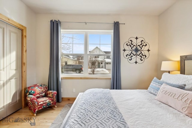 bedroom with wood finished floors