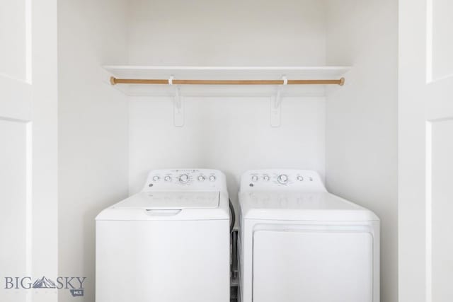 laundry room featuring washing machine and dryer