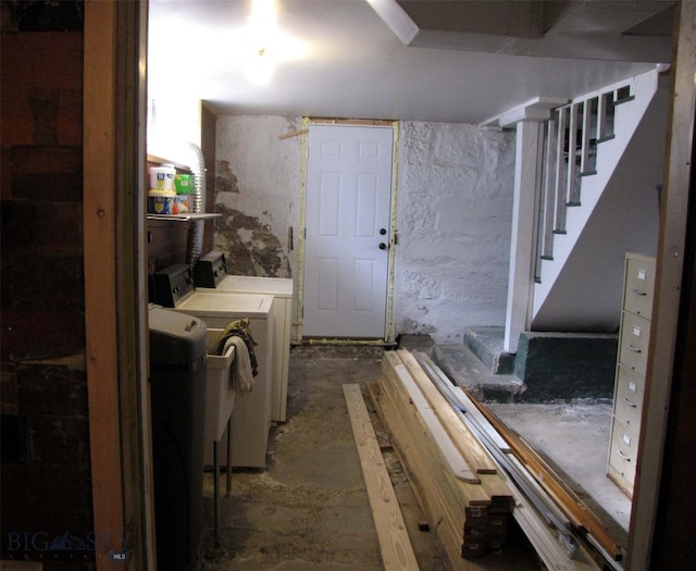 finished basement with stairway and separate washer and dryer