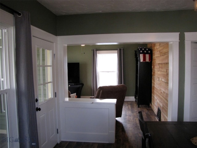 interior space with dark wood-style floors