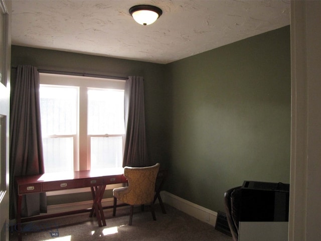 office area with carpet flooring and baseboards