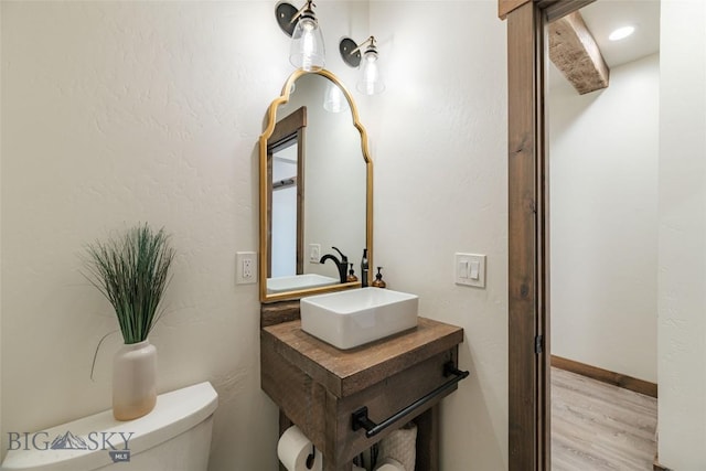 18287 Haasakker Rd, Three Forks, MT 59752 - half bath featuring wood finished floors and toilet