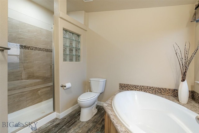 18287 Haasakker Rd, Three Forks, MT 59752 - full bath featuring a bath, wood finished floors, and a stall shower