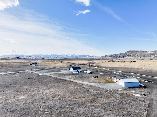 18287 Haasakker Rd, Three Forks, MT 59752 - overview of rural landscape with a mountain backdrop
